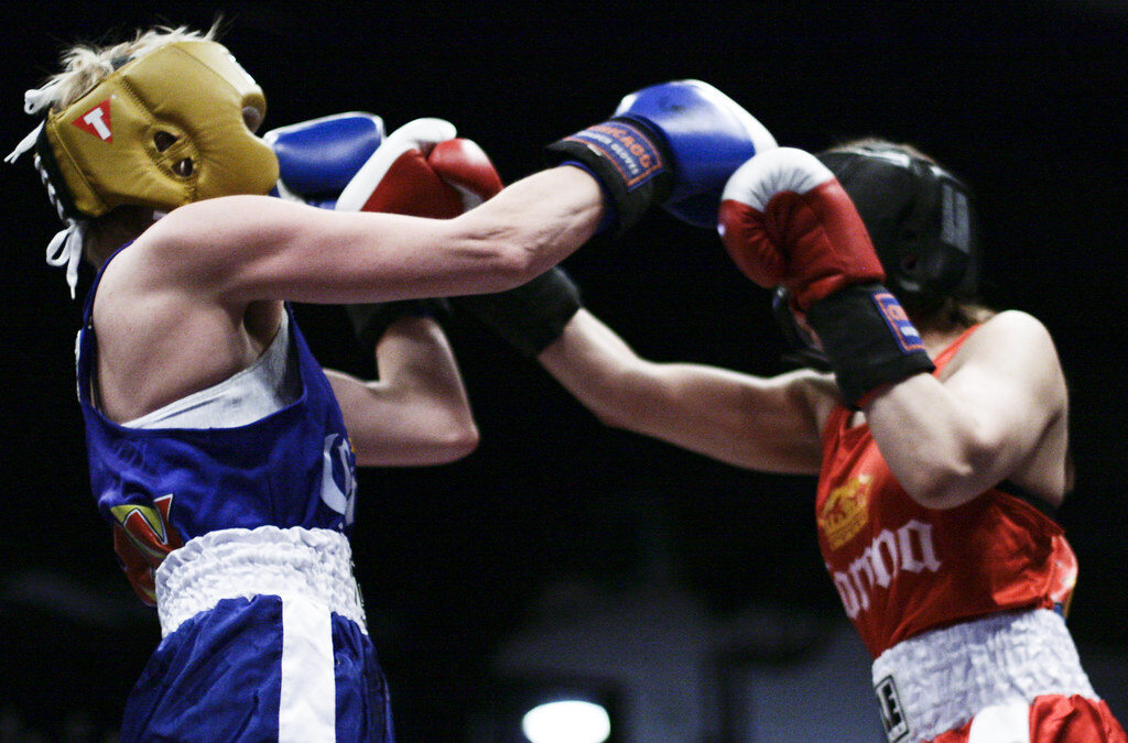 Two amateur boxers exchanging punches during the Chicago Golden Gloves