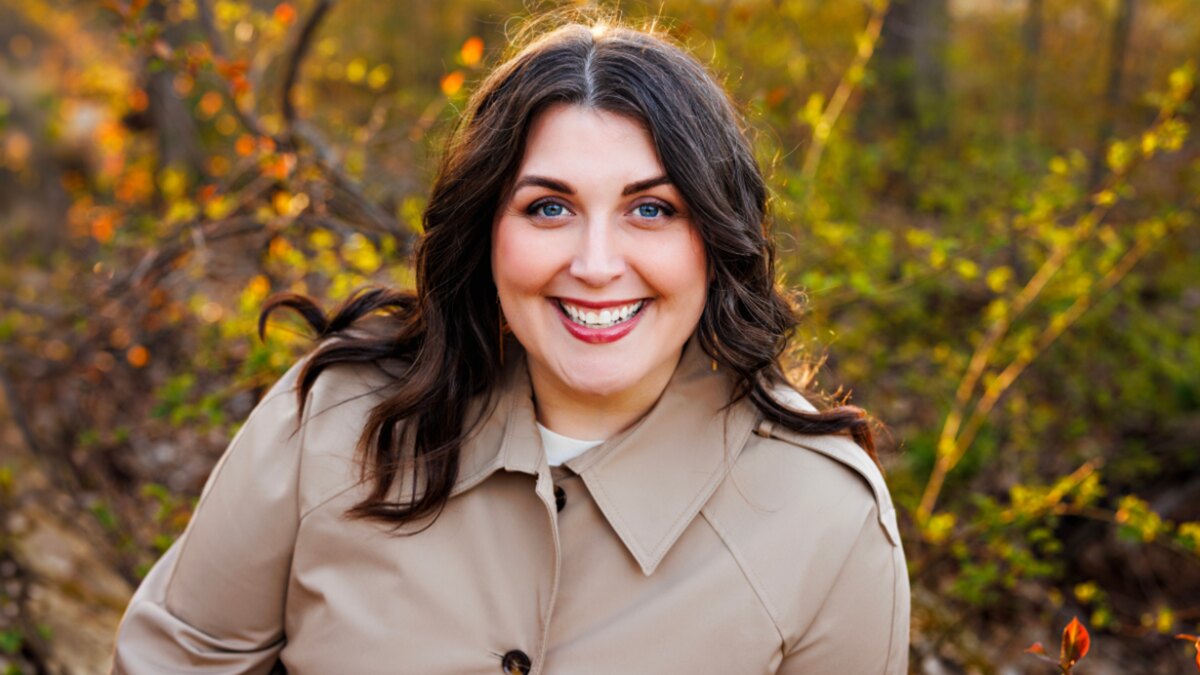 Ashley Hatley Caruso, new director of the Geneva Lake Conservancy, outdoors in autumn light